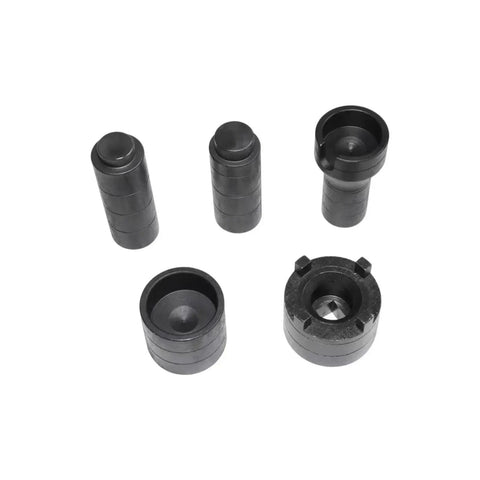 Top view of a five-piece black Porsche dual-clutch housing removal tool set with cylindrical spacers
