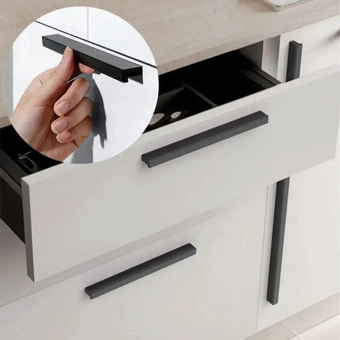 Installed Black Tilted Aluminum Cabinet Handles 12 Pack 5 Inch 128mm Hole Centers on kitchen drawer with a hand pulling