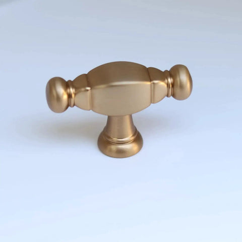 Champagne bronze bar cabinet knob made of durable zinc alloy, modern hardware for kitchen or bathroom, single hole installation option.
