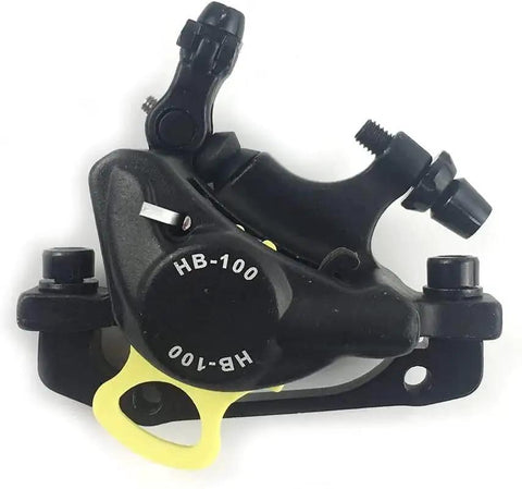 HB-100 hydraulic disc brake caliper, black with yellow accent, MTB front view