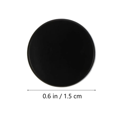 Close-up of a single black button, 0.6 inch diameter, part of 10 Sets Copper Covered Button Kit For Clothes, Bags, And Coats.