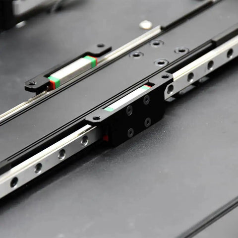 Close-up of Y Axis Linear Rail Upgrade for Ender 3 S1 Pro MGN9H showing stainless steel rail and beefed up bearings.