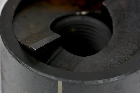 Close-up of slug splitting conduit punch die for hydraulic knockout driver, 1-1/4 inch fitting, 9 ton punching force