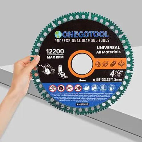 Person holding ONEGOTOOL Indestructible Diamond Cut Off Wheels For Angle Grinder Four And A Half Inch With Seven Eighths Arbor, 3 pack.
