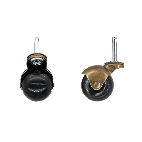 Two antique brass finish ball casters with 2 inch cyan wheels for heavy duty furniture, showing front and side views