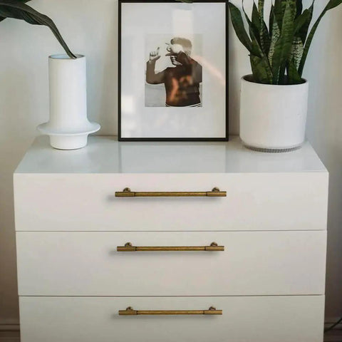 Dresser with vintage antique brass zinc alloy cabinet handles with striped detailing, 128mm center-to-center, corrosion-resistant hardware