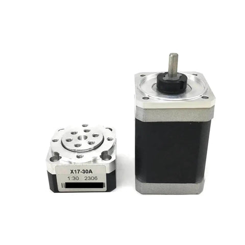 Compact Strain Wave Gearbox Speed Reducer For NEMA 17 Stepper Motors next to housing component, 60mm aluminum, precision-machined