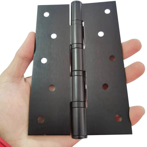 Hand holding 6 Inch Ball Bearing Door Hinges For Heavy Duty Wood Doors Non Mortise With Mounting Hardware Brushed Black Stainless Steel 304