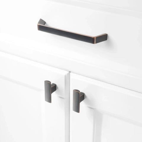 10 Pack 5 Inch Oil Rubbed Bronze Cabinet Pulls Set installed on white kitchen cabinet with smooth rounded corners solid metal hardware