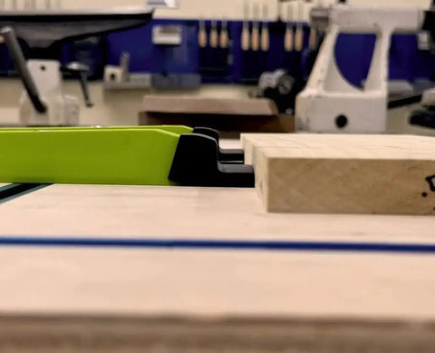Low Profile Clamp Kit in use on CNC machine showcasing hold-down clamps and workbench setup for solid workholding.