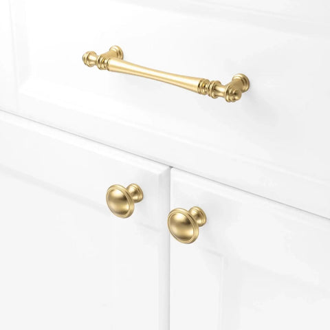 10 Pack 5 Inch Brushed Gold Kitchen Cabinet Handles And Drawer Pulls installed on white cabinet doors