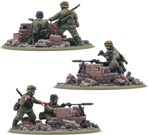 Bolt Action Rattenkrieg German Veteran Infantry Starter Army with soldiers behind brick walls, unassembled and unpainted miniatures for wargaming