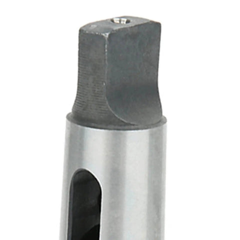 Close-up of drill sleeve adapter MT3-to-MT2 taper, small silver metal body with square male end