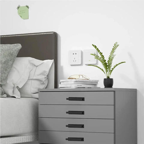 10 Pack Self Stick Push Pull Helper ABS Plastic Wardrobe Handles for cabinets, shown on a grey bedside drawer in a bedroom setting.