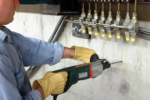 Fixed-Depth Bit MDPL050DIA For Three Eighths Inch Drop-In Anchors drilling into concrete wall