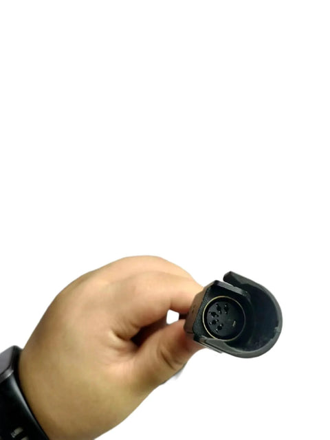 Close-up of Power Recliner Motor Replacement Linear Actuator KDFSJ4036 connector held in hand, showing aluminum body.