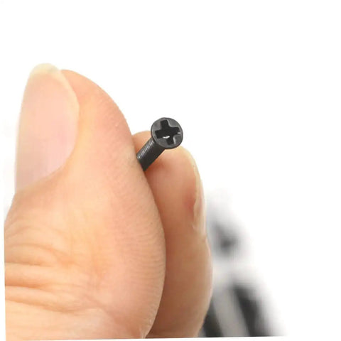Close-up of a miniature screw from Two Piece Miniature Screw Set With Countersunk Round Screws For Small Machines Notebooks And Glasses Repair