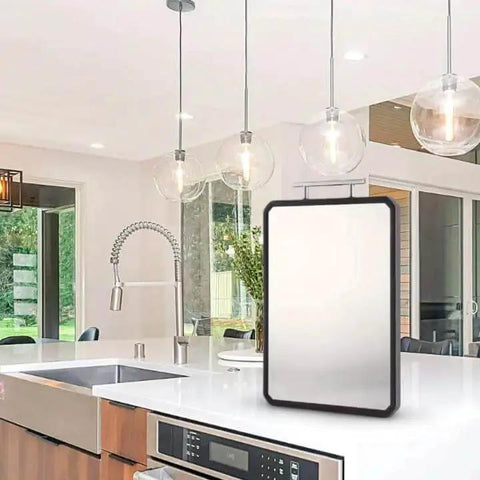 Dual Surface Titanium And Wheat Straw Cutting Board With Juice Groove on a white kitchen counter, showing titanium side.