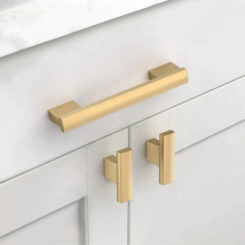 Champagne bronze cabinet pull installed on white kitchen cabinet from 12 Pack 4 Inch Champagne Bronze Cabinet Pulls Set CK0015.