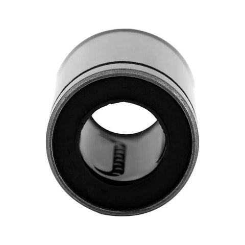 Close-up view of a single LM10UU linear ball bearing from pack of 8, 10mm inner diameter for 3D printers CNC machines DIY projects, steel material.