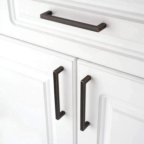 Oil Rubbed Bronze Solid Square Kitchen Cabinet Handles 5 Inch installed on white cabinets, showing smooth rounded corners