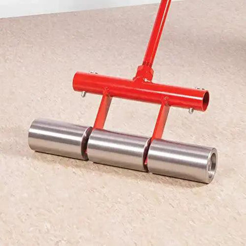 Model 10-935 Lightweight 35-Pound Flooring Roller with chrome-plated rollers and removable handle on vinyl flooring