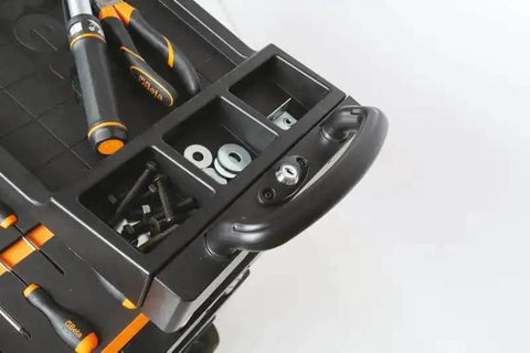 Close-up of orange collapsible rolling tool cart with locking drawers, thermoplastic worktop, showcasing tool compartments and handle.