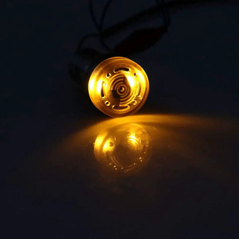 Yellow Indicator Light With Buzzer 12V AC DC, 22mm Panel Mount Flashing Alarm, high brightness LED glowing in dark, front view.