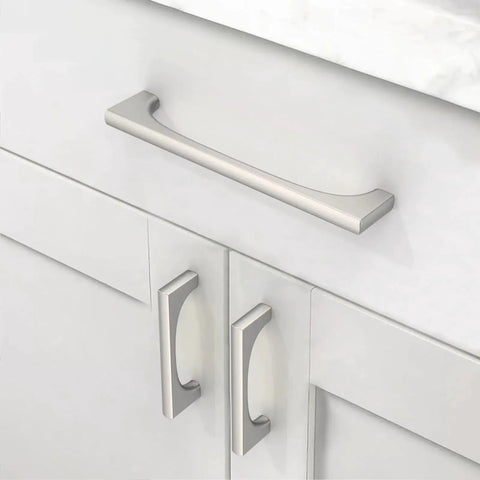 Installed 5 inch brushed satin nickel cabinet pulls on white drawers, part of 10 Pack 5 Inch Brushed Satin Nickel Cabinet Pulls For Cupboards And Drawers