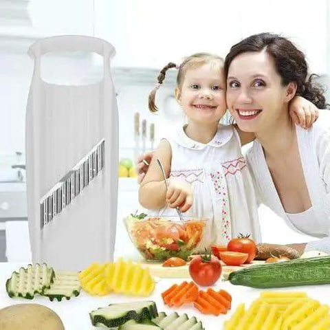 Wave Waffle XXL Crinkle Cutter For Veggies And Fries with crinkle-cut vegetables, shown with a mother and child in a kitchen