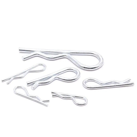 Assortment of zinc plated hair pin cotter pins in various sizes, part of the Heavy Duty Zinc Plated Hair Pin Cotter Pin And Hitch Pin Assortment Kit 150 Pieces In Six Sizes Clear Storage Box Corrosion Resistant Steel Fasteners For Trailers Auto Farm Equipment And Outdoor Projects.