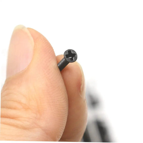 Close-up of a miniature flat head screw from Two Pack 18 18 Specification Screw Set for laptop repair and DIY projects.