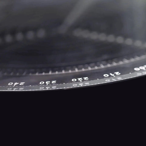 Close-up view of markings on Round Center Finder Compass For Wood Lathe And Bowl Making 200mm Centering Tool in clear acrylic.
