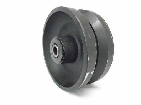Close-up of a black iron steel wheel from a Heavy Duty 5 Inch By 2 Inch Rigid Caster Set Of Four with Seven Eighths Inch V Groove, 900 LB capacity.