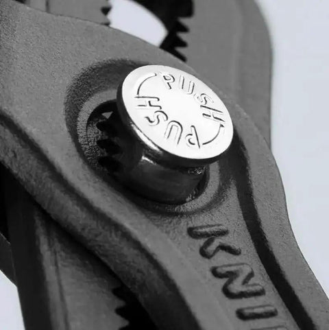 Close-up of Cobra Water Pump Pliers 7 And A Quarter Inch Beefy Self Locking Pliers with push button and teeth grip details.