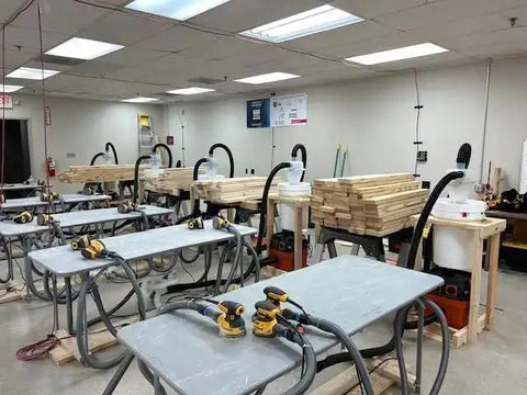 Workshop with multiple tables using Sixteen Foot Flexible Vacuum Hose For Home And Shop Use With Multi Brand Dust Collection Adapters