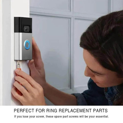 Person installing doorbell using Doorbell Screw Replacement Set For Video Doorbells Includes Twenty Screws In Four Types With Four Of Each Size Short And Long T16 And T5 Compatible With Video Doorbell 2 And Doorbell Pro HeavyDuty Industrial Hardened Carbon Steel Construction DIY Install.