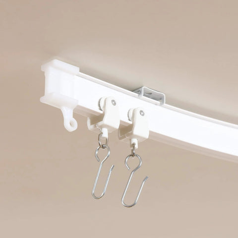 Easy Glide Ceiling Curtain Track System Flexible Durable Design for Effortless Gliding with hooks visible in close-up