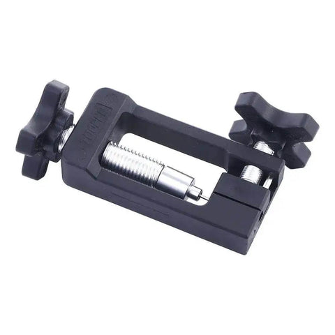 Close-up of Bike Disc Brake Olive Connector And Needle Driver Kit with metal and nylon components on white background.