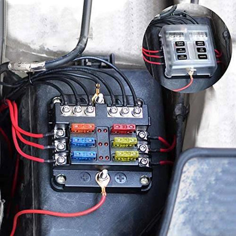 Waterproof 6 Way Fuse Block With Ground Negative Busbar, 100 Amp Max, LED Indicator, 12-24V DC, installed in a vehicle