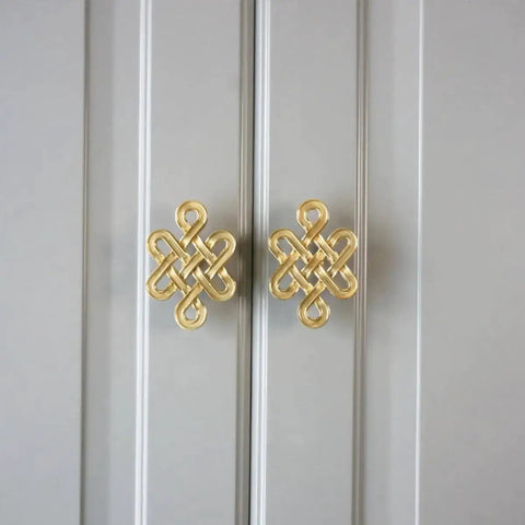 Chinese Knot Cabinet Pull Handle With Single Hole Design For Wardrobes Cabinets And Dressers Easy Install, gold knob on gray cabinet.