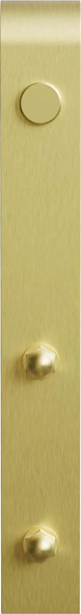 Close-up of a gold-colored metal strap with rounded fasteners on a barn door hardware kit.