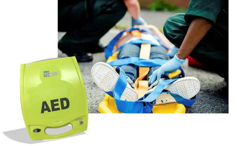 Automated Defibrillator With Real CPR Help And Real Time Feedback For Accurate Chest Compressions Easy Audio Visual Prompts And Quick BLS Rescue From Zoll AED Plus shown near a medical rescue scene.