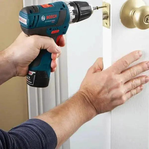 Using the 91 Piece Drilling And Driving Mixed Bit Set For Wood Metal And Masonry By Bosch with driver bits in a door lock.