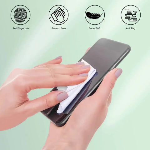 Using 12 Pack Microfiber Glasses Cleaning Cloth 5x6 Inch Lens Wipes for Eyewear to clean a smartphone screen, showing anti-fingerprint icons.