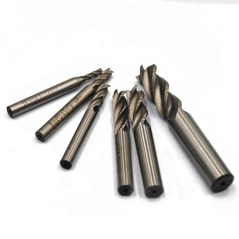 Pro Grade High Speed Steel End Mill Cutter Set Of Six With Four Flute Straight Bits In One Eighth Inch, Three Sixteenths Inch, One Quarter Inch, Five Sixteenths Inch, Three Eighths Inch, And One Half Inch Diameters For Hard Metals And DIY Milling.