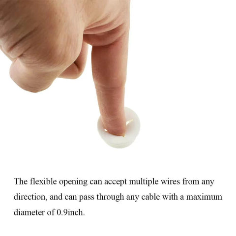 Demonstration of a white flexible rubber desk grommet with finger showing cable pass-through capability for wire organization.