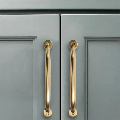 3 Inch Hole Center Brushed Brass Cabinet Pulls 10 Pack Heavy Duty Solid Drawer Handles installed on gray cabinet doors