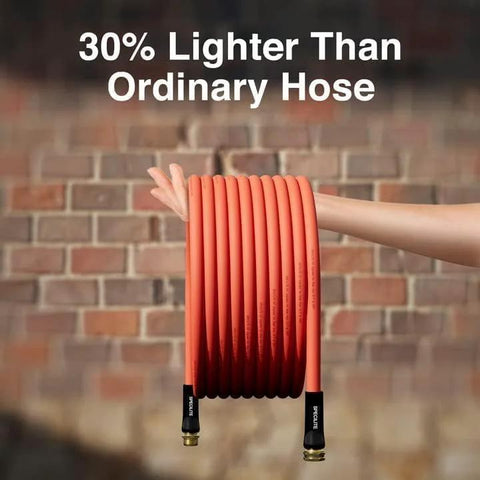 SPECILITE 5/8-inch rubber garden hose, orange, coiled with 3/4-inch brass fittings, held against a brick wall.