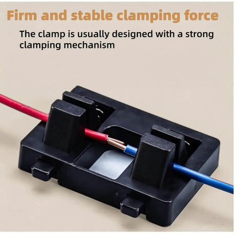 Pro Grade Wire Welding Fixture With Black Base And Bright Orange Helping Hands Clamp holding red and blue wires securely.